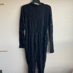 Missguided black lace catsuit. Size 10.